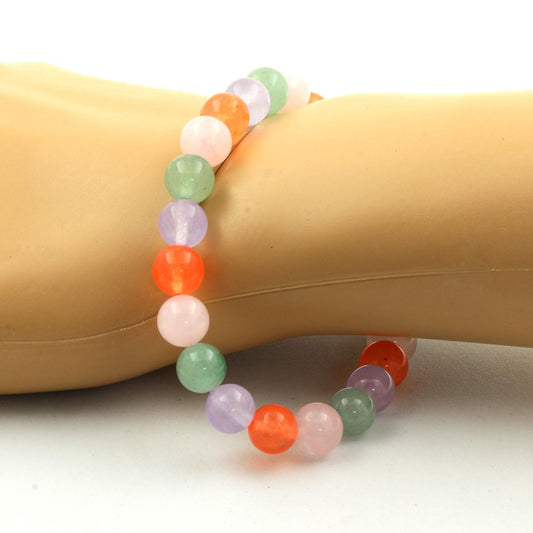Aventurine + Calcédoine orange + Quartz rose + Calcédoine lavande. Bracelet en Perles naturelles