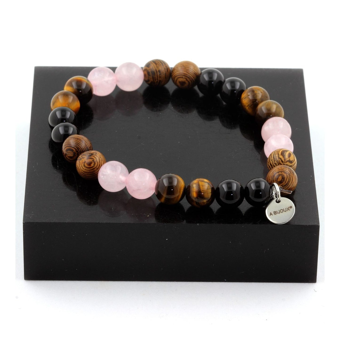 Quartz rose + Oeil de Tigre + Agate noire + bois. Bracelet en Perles naturelles