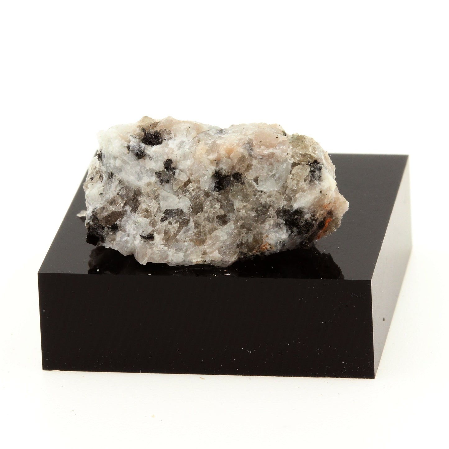 Adamellite mineral. 20.9 carats. Maine, USA