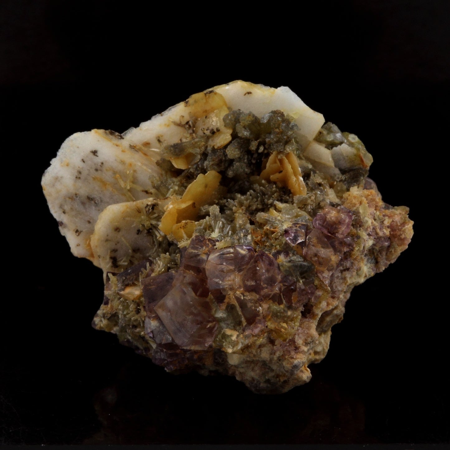 Wulfenite, Mimetite, Baryte, Fluorite. 27.6 carats. Lantignié, France