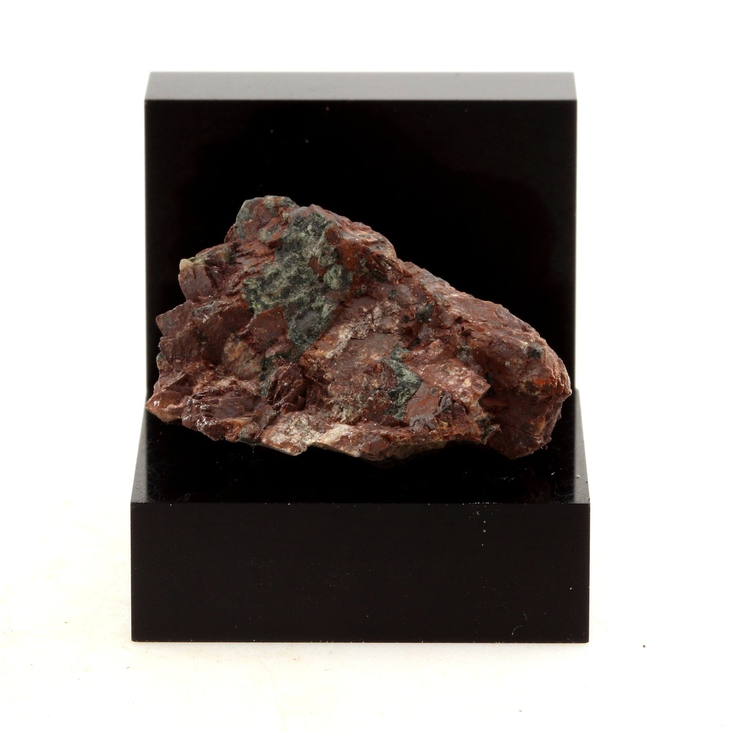 Augite syenite. 34.64 carats. Grenville, Québec, Canada