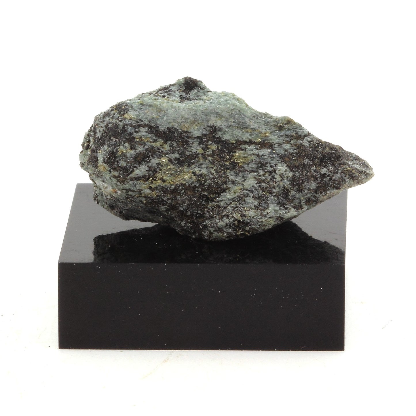 Diopside + Pyrite. 42.6 carats. Lanark, Ontario, Canada