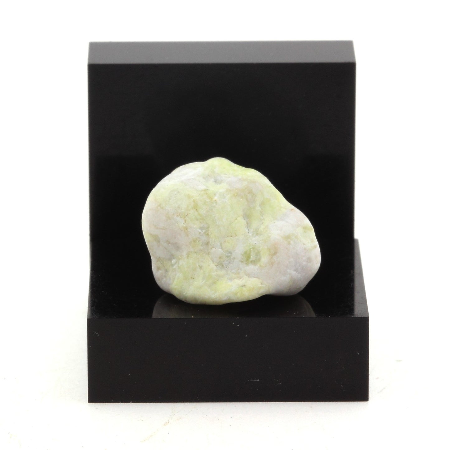 Calcite + Apatite. 18.9 carats. Lanark, Ontario, Canada