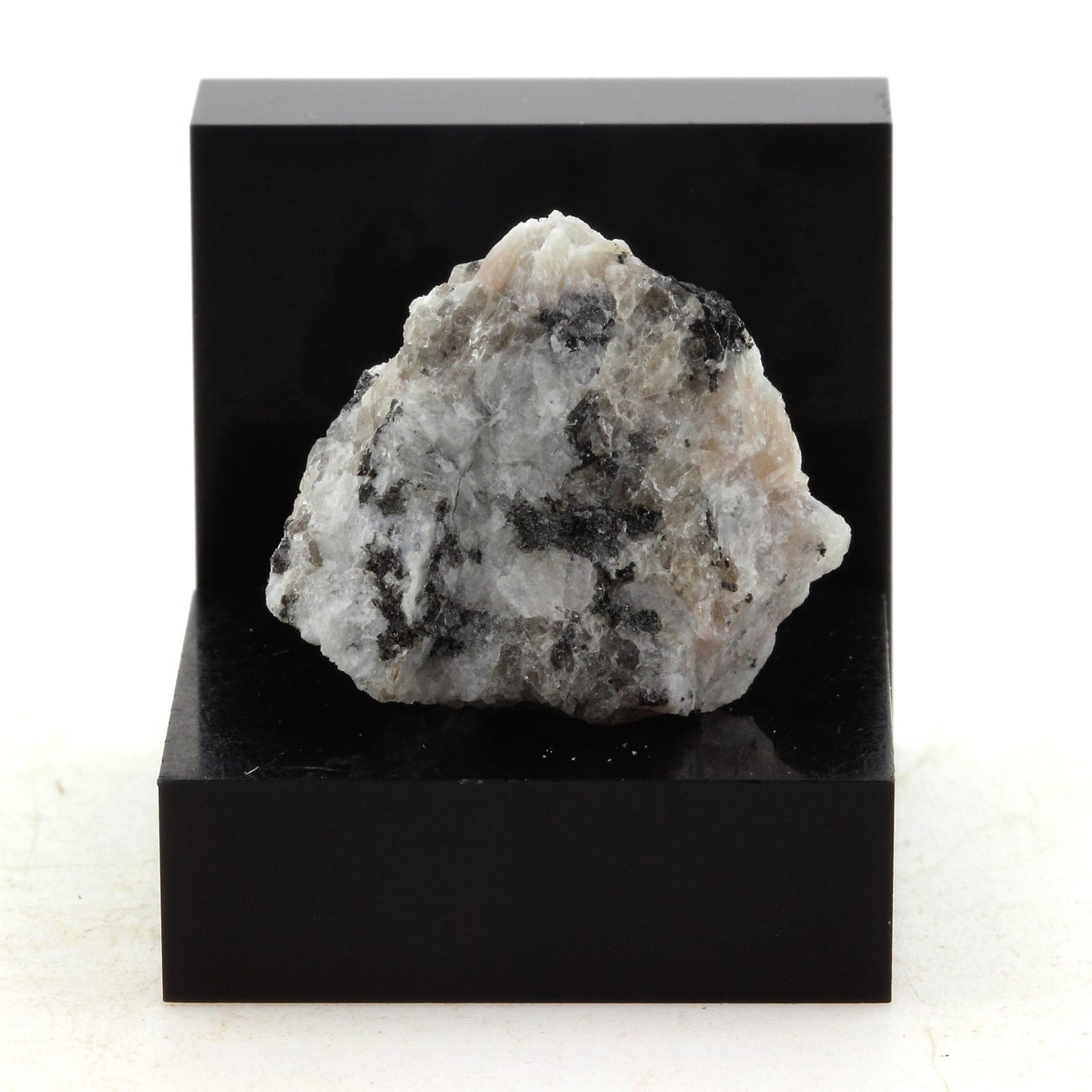 Adamellite mineral. 34.4 carats. Maine, USA