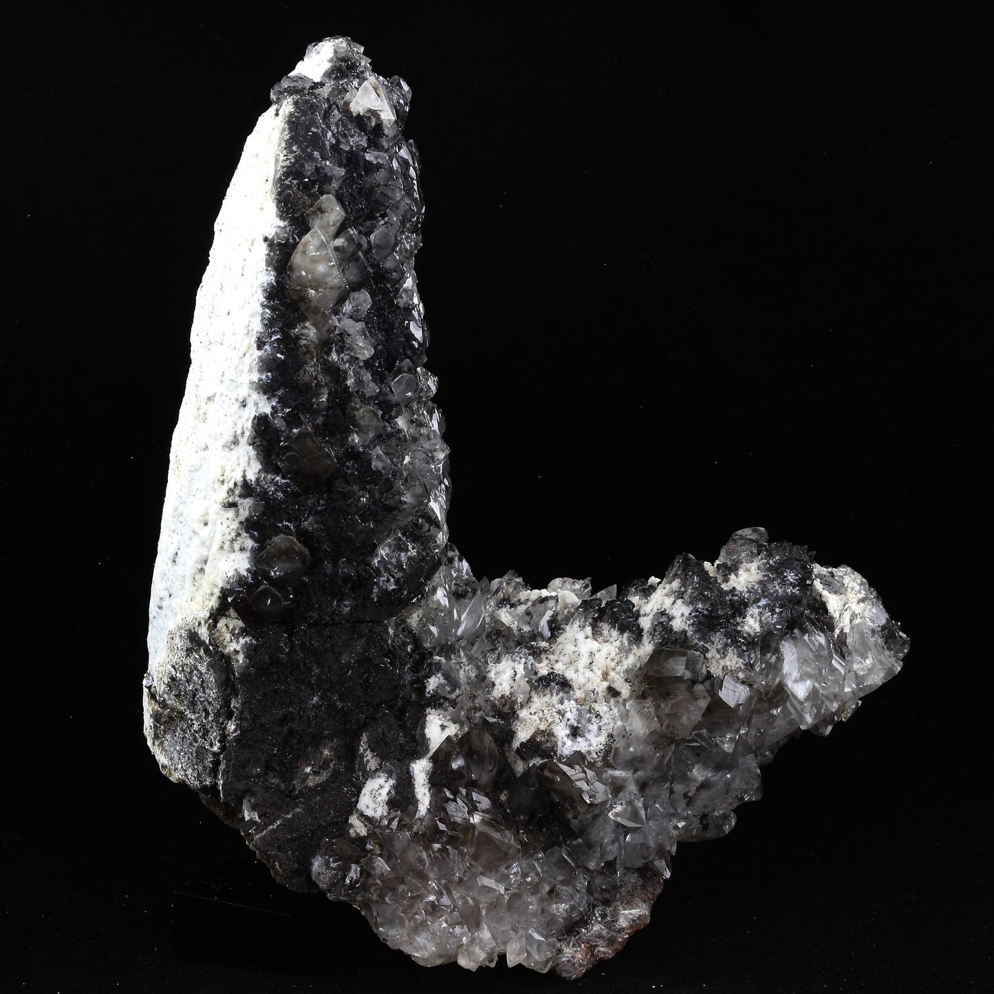 Calcite + Palygorskite + Romanechite. 2797.0 carats. Palmarejo Mine, Chihuahua, Mexique