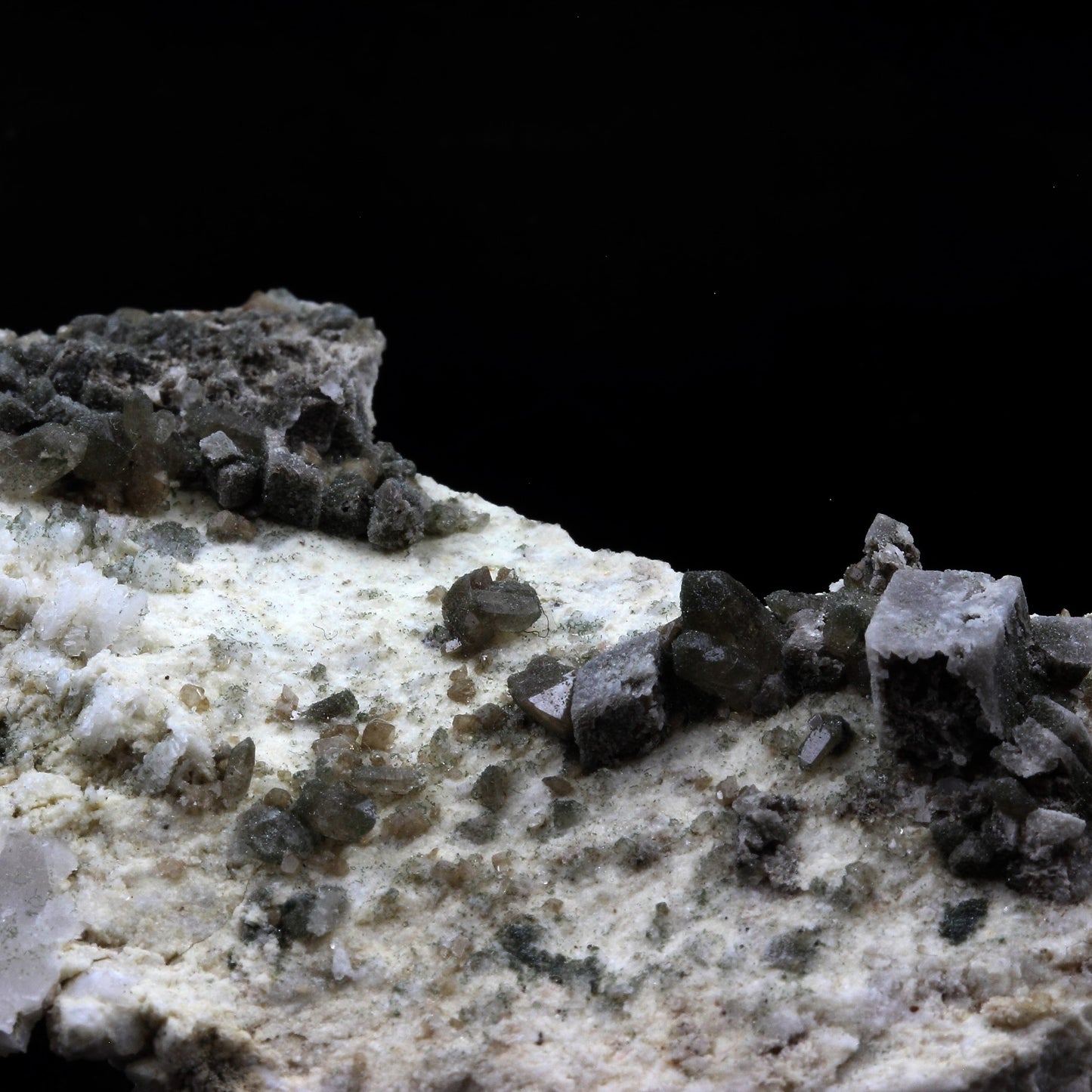 Titanite (Sphene) + Calcite. 236.0 carats. Entre Deux Roches, Massif de la Lauzière, France