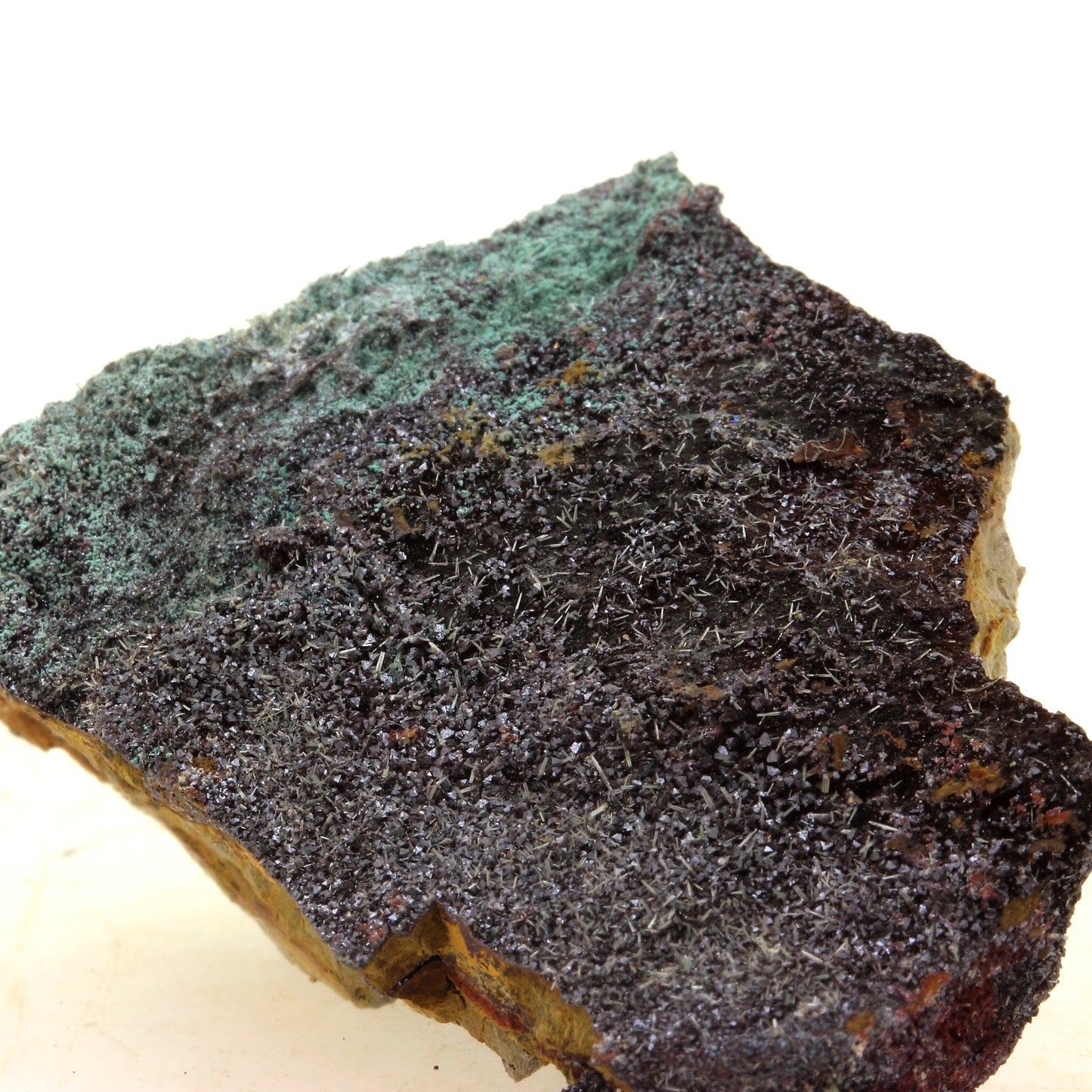 Mimetite, Cuprite, Malachite. 99.0 carats. Rouez mine, Sarthe, France