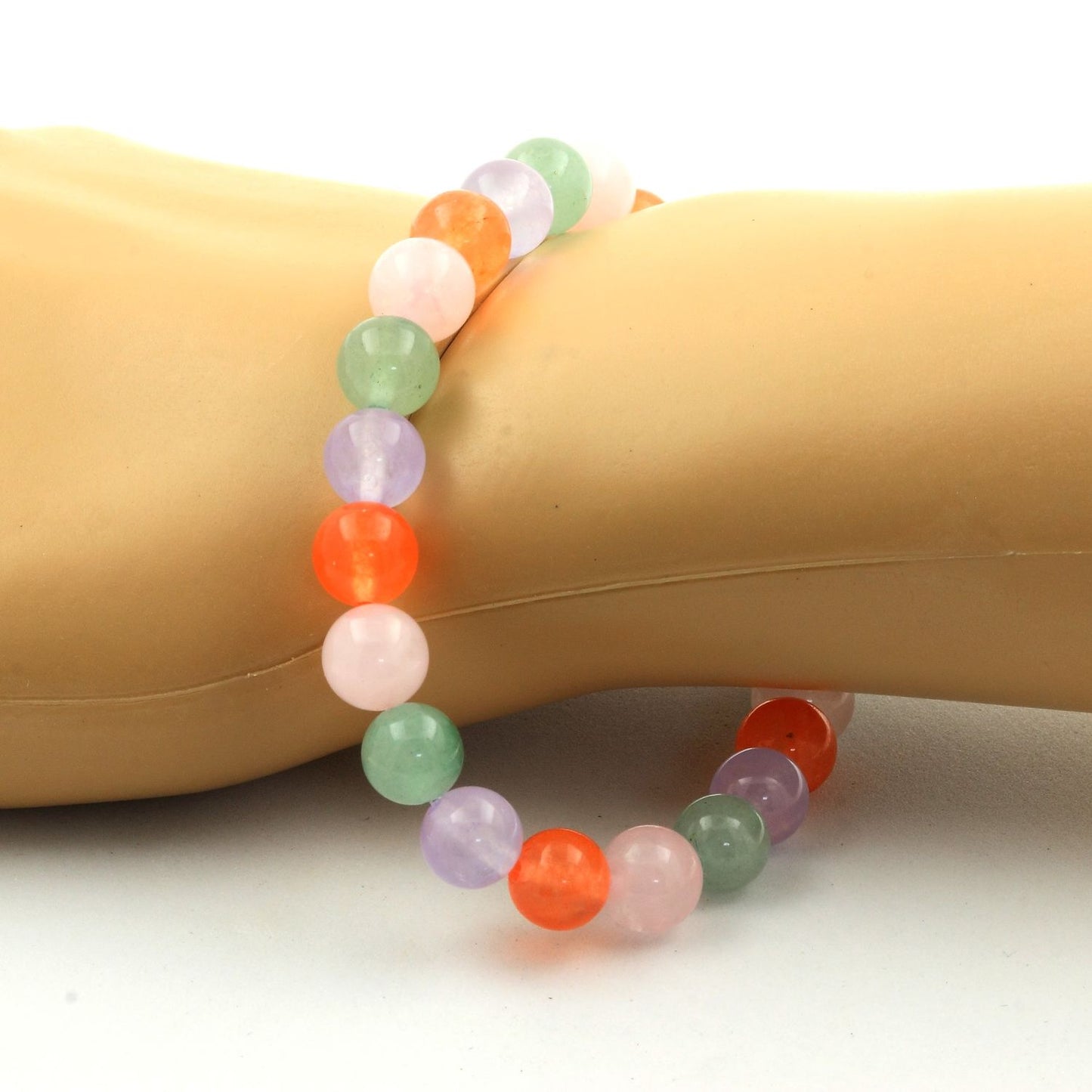 Aventurine + Calcédoine orange + Quartz rose + Calcédoine lavande. Bracelet en Perles naturelles