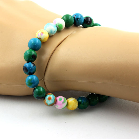 Chrysocolle + Jaspe orange bleu + Jaspe jaune violet + Jaspe vert rose. Bracelet en Perles naturelles