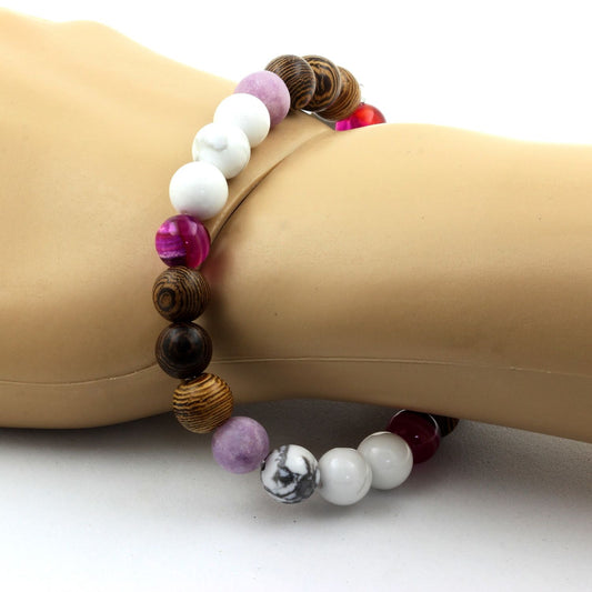 Howlite + Agate rubanée rose + Mica violet mat + bois. Bracelet en Perles naturelles