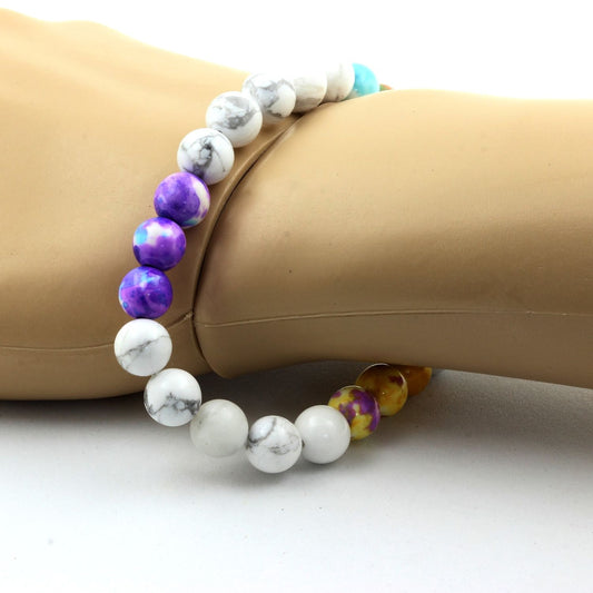Howlite + Jaspe orange bleu + Jaspe violet bleu + Jaspe jaune violet. Bracelet en Perles naturelles