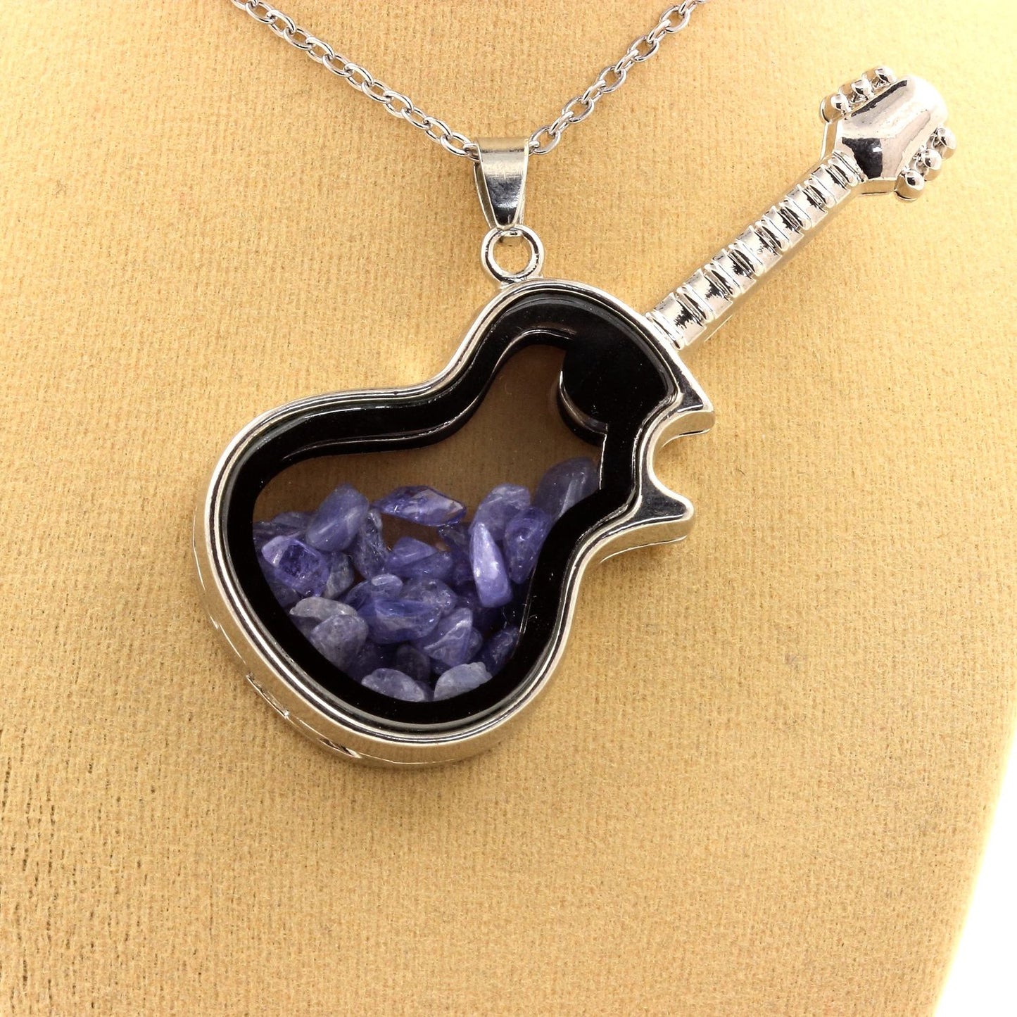 Collier Tanzanite brut modèle guitare