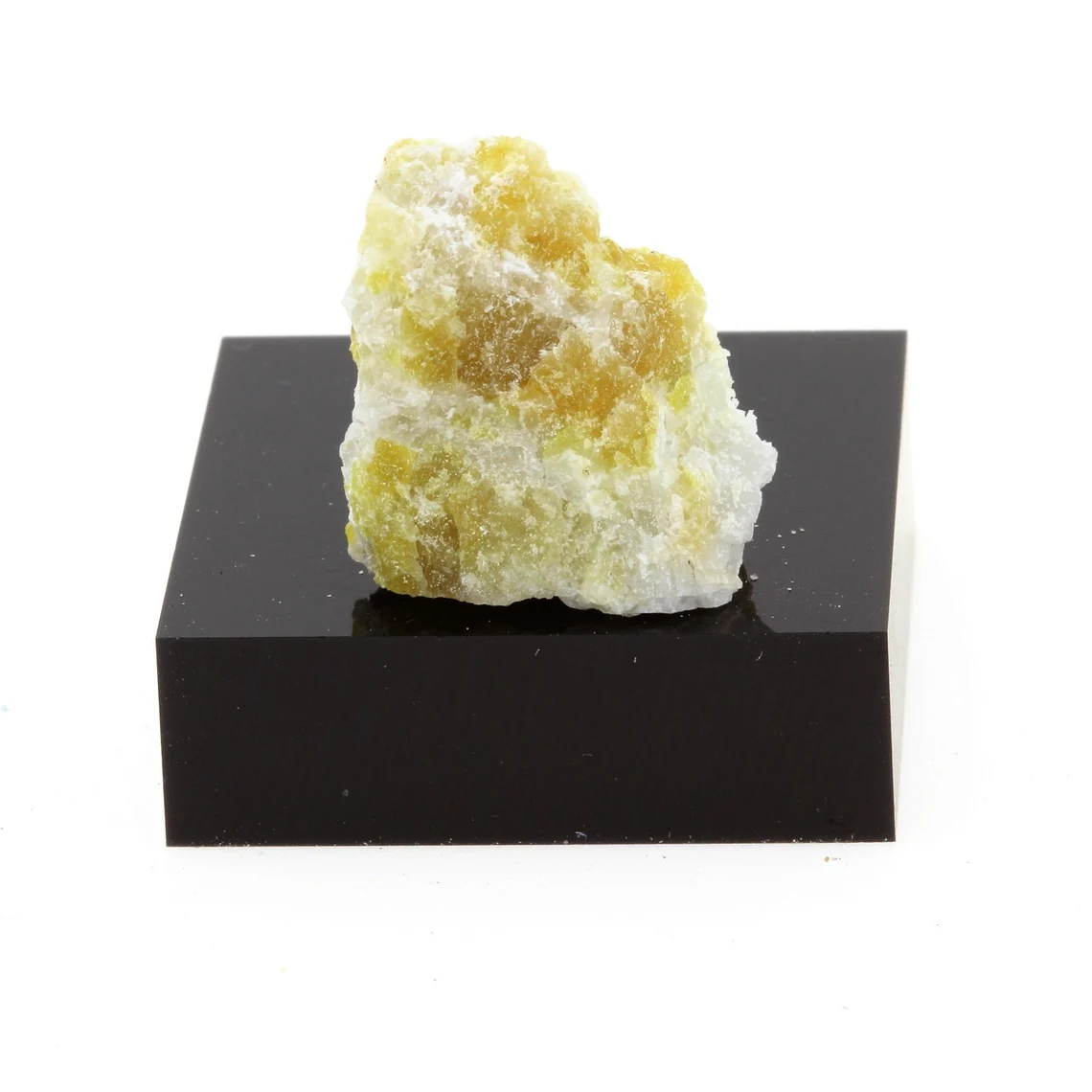 Calcite + Epidote. 19.1 carats. Marmora, Ontario, Canada